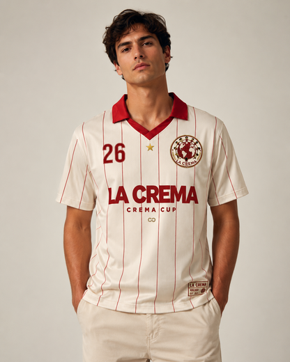 Male model wearing cream and burgundy La Crema Crema Cup jersey front view