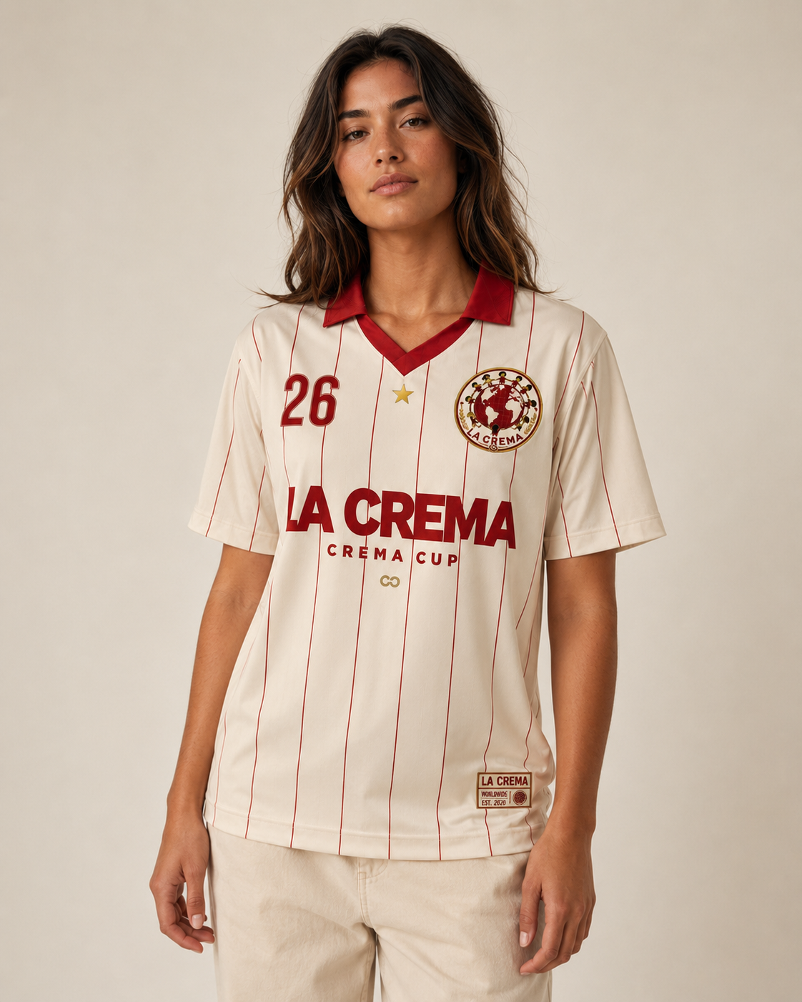 Woman wearing cream and burgundy La Crema Crema Cup jersey